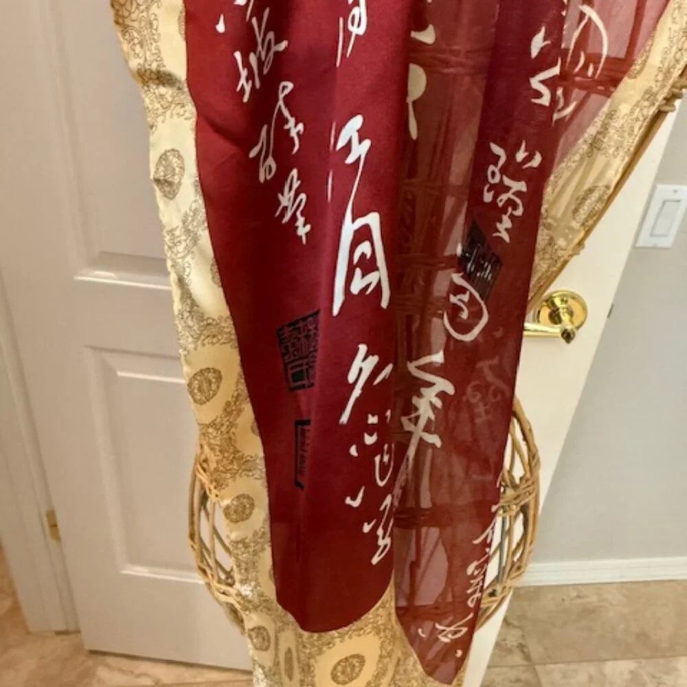 Vintage 100% silk rust and gold oblong scarf.